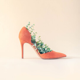 Minimal,Sustainable,Fashion,Concept,With,Orange,High,Heels,And,Green