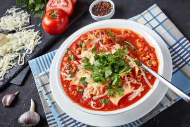 Close-up,Of,Chicken,Lasagna,Soup,In,A,White,Bowl,On