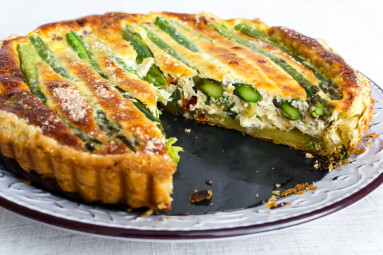 Tart,With,Green,Asparagus,And,Toasted,Cheese,On,The,Table