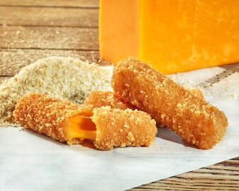 Deep-fried,Cheddar,Cheese,Sticks,In,Breadcrumbs,On,Wooden,Table
