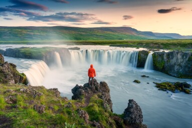 Majestic,Landscape,Of,Godafoss,Waterfall,Flowing,With,Colorful,Sunset,Sky