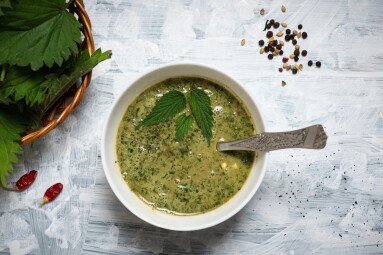 Refreshing,Green,Creamy,Nettle,Soup,In,A,White,Bowl,On