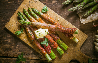 Asparagus,Wrapped,In,Bacon,,On,A,Wooden,Background,,Rustic,Style