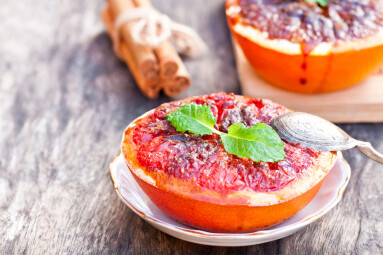 Baked,Grapefruit,With,Brown,Sugar,And,Cinnamon,On,A,Saucer