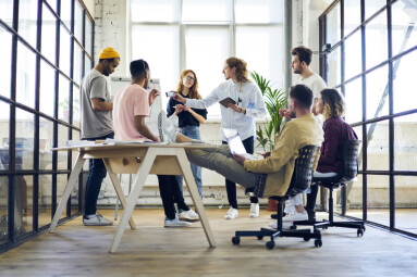 Talented,Male,And,Female,Graphic,Designers,Having,Discussion,About,Starting