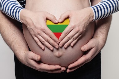 Lithuanian,Family,Concept.,Man,Embracing,Pregnant,Woman,Belly,And,Heart