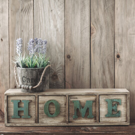 Storage,Box,With,Home,Letters,And,Flowers,In,A,Pot