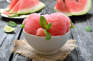 Watermelon,Ice,Cream,With,Slices,In,Bowl,On,Wooden,Table