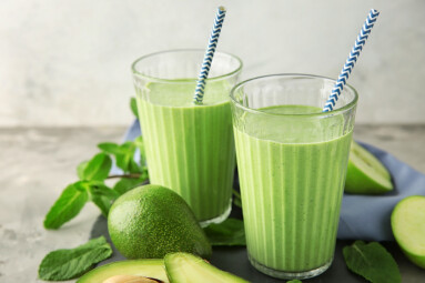 Glasses,Of,Tasty,Avocado,Smoothie,And,Ingredients,On,Grey,Table