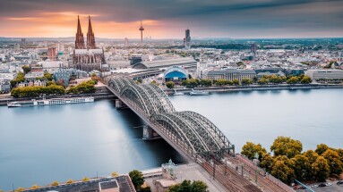 Cologne,Aerial,View,With,Trains,Move,On,A,Bridge,Over