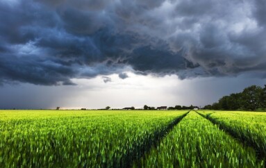 Dark,Rain,Cloud,With,Storm,Over,A,Green,Field,With