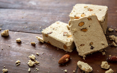 Halva,Sunflower,And,Almonds,On,Wooden,Table,Background.,Vanilla,Halvah