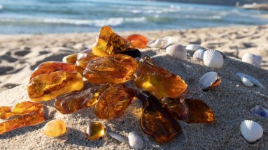 Shiny,Transparent,Orange,Baltic,Amber,Stones,On,A,Sand.,Old