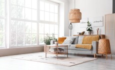 Interior,Of,Light,Living,Room,With,Cozy,Grey,Sofa,And