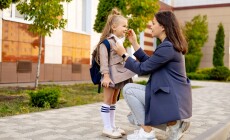 Mom,Accompanies,Her,First-grader,Daughter,To,School,,Kissing,Her,And