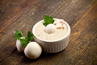 Delicious,Homemade,Mushroom,Sauce,On,Wooden,Table,With,Parsley