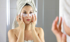 Beauty,Woman,Applying,Anti-fatigue,Under-eye,Mask,Looking,Herself,In,The