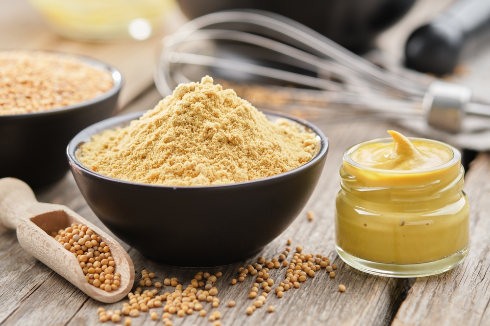 Mustard,Sauce,Jar,And,Bowl,Of,Powdered,Mustard,Seeds.,Scoop