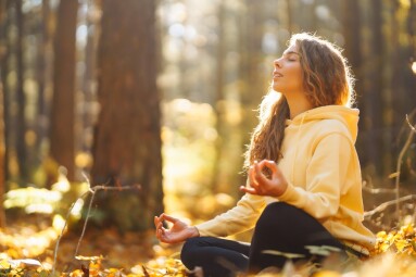 Active,Woman,Practices,Yoga,In,The,Autumn,Forest,Among,Yellow