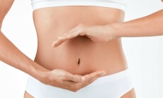 Stomach,,Wellness,And,Hands,Of,Woman,In,Studio,For,Digestion,