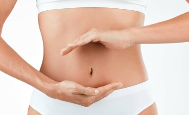 Stomach,,Wellness,And,Hands,Of,Woman,In,Studio,For,Digestion,