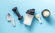 Protein,Powder,In,Jar,And,Scoop,For,Sports,Nutrition,With