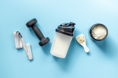 Protein,Powder,In,Jar,And,Scoop,For,Sports,Nutrition,With