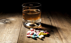 Alcohol,And,Pills,With,Shadow,And,Little,Black,Background