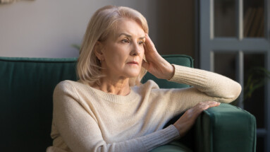 Pensive,Thoughtful,Middle,Aged,Lady,Looking,Away,Sit,Alone,At