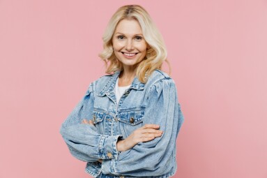 Elderly,Smiling,Happy,Confident,Woman,50s,Wearing,Denim,Jacket,Hold