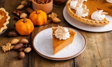 Traditional,Pumpkin,Pie,For,Thanksgiving,With,Whipped,Cream,And,Leaf