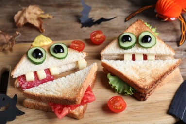 Cute,Monster,Sandwiches,Served,On,Wooden,Board,,Closeup.,Halloween,Party