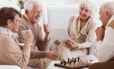 Happy,Pensioners,Of,Rest,Home,Playing,Chess