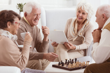 Happy,Pensioners,Of,Rest,Home,Playing,Chess