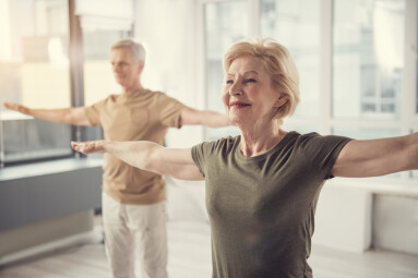 Waist,Up,Portrait,Of,Old,Jolly,Lady,With,Arms,Straightened