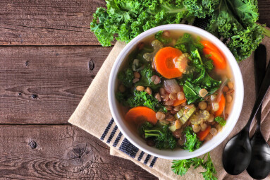 Healthy,Vegetable,Soup,With,Kale,And,Lentils.,Above,View,Table