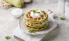 Zucchini,Waffles,With,Sour,Cream.,Waffles,Are,Decorated,With,Sour