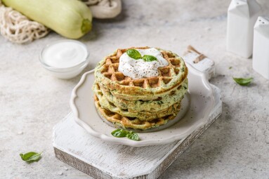 Zucchini,Waffles,With,Sour,Cream.,Waffles,Are,Decorated,With,Sour