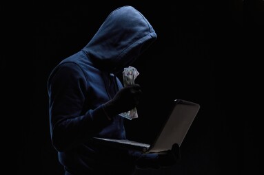 Hacker,With,A,Laptop,Fraudulently,Steals,Financial,Data.,Security,Of