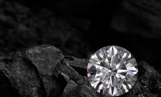 Diamond,On,Black,Coal,Background