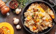 Pumpkin,Mushrooms,Risotto,With,Fresh,Thyme,In,Ceramic,Bowl.,Italian