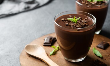 Chocolate,Cocoa,Pudding,,Mousse,In,Glass,Cup,On,Rustic,Table,