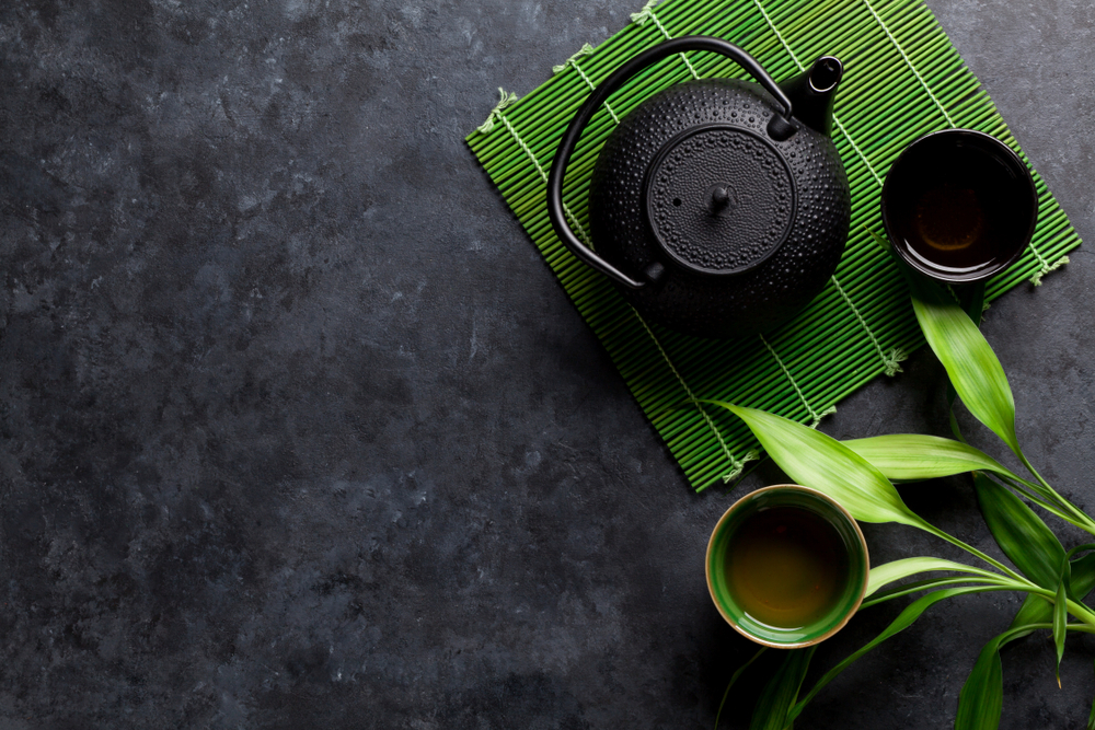 Green,Japanese,Tea,On,Stone,Table.,Top,View,With,Copy