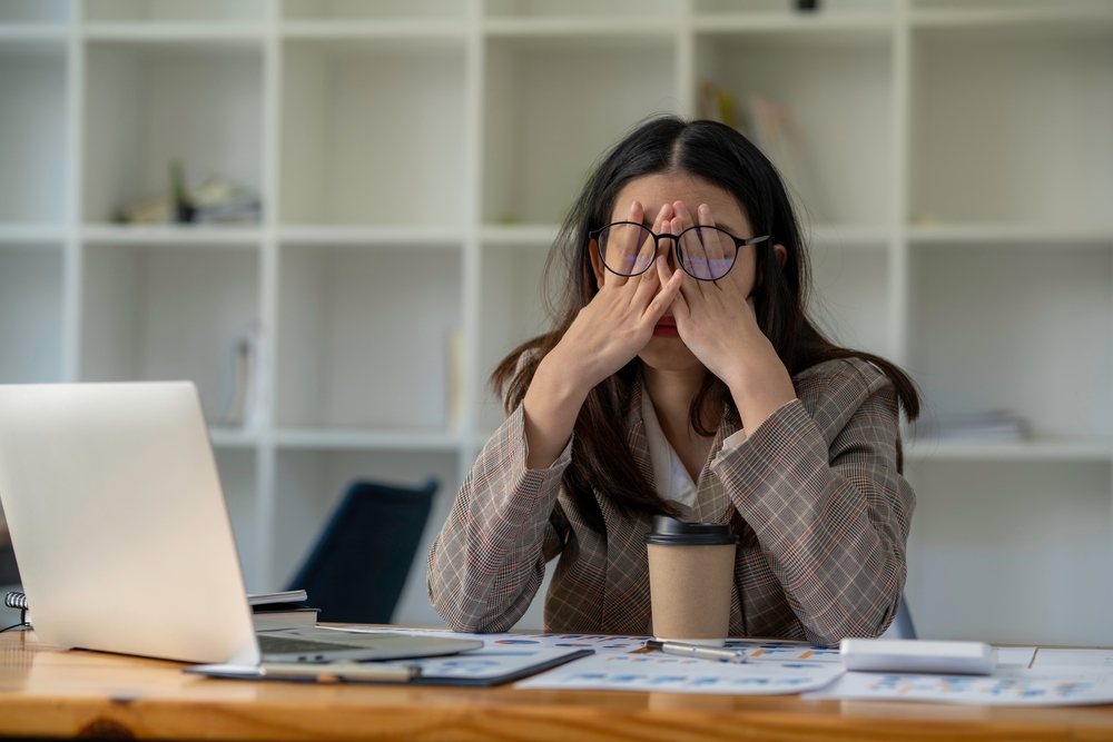 Tired,Business,Woman,Sleepy,And,Bored,From,Sitting,At,A