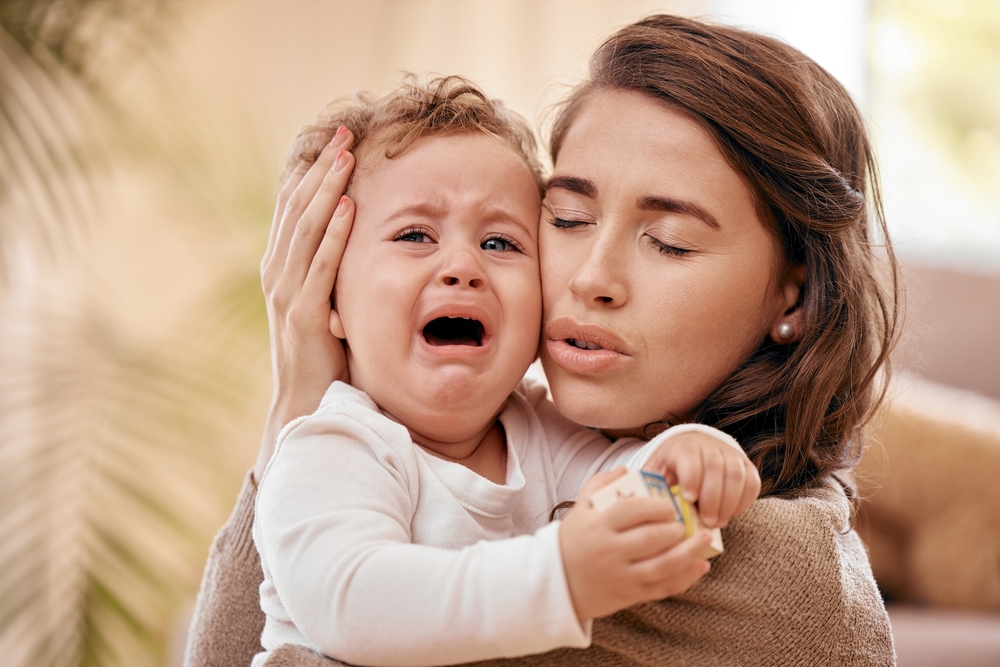 Woman,,Baby,And,Discomfort,In,Crying,For,Hunger,,Teething,Pain