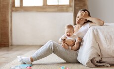 Tired,Infant,Baby,Cries,In,Mother,Hands,,Depressed,Unhappy,Exhausted