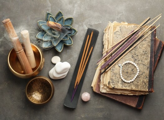 Flat,Lay,Composition,With,Incense,Sticks,On,Gray,Textured,Table.