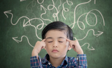 Picture,Of,Little,Boy,Thinking,With,Eyes,Closed,While,Sitting