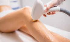 Close-up,Woman's,Perfect,Legs,While,Getting,Hair,Removal,Procedure,In