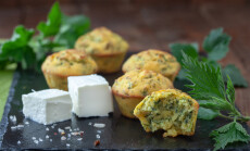 Fresh,Homemade,Muffins,With,Cheese,And,Nettle,On,Wooden,Table.